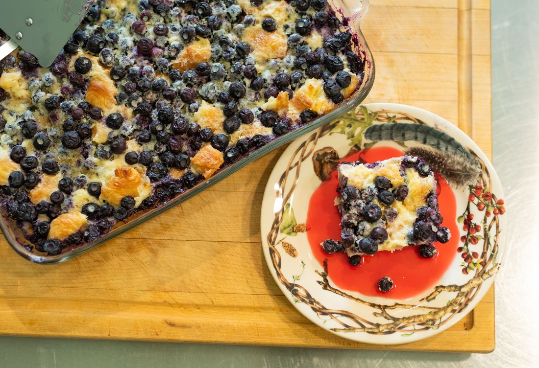 Buttermilk blueberry bread pudding with berry sauce